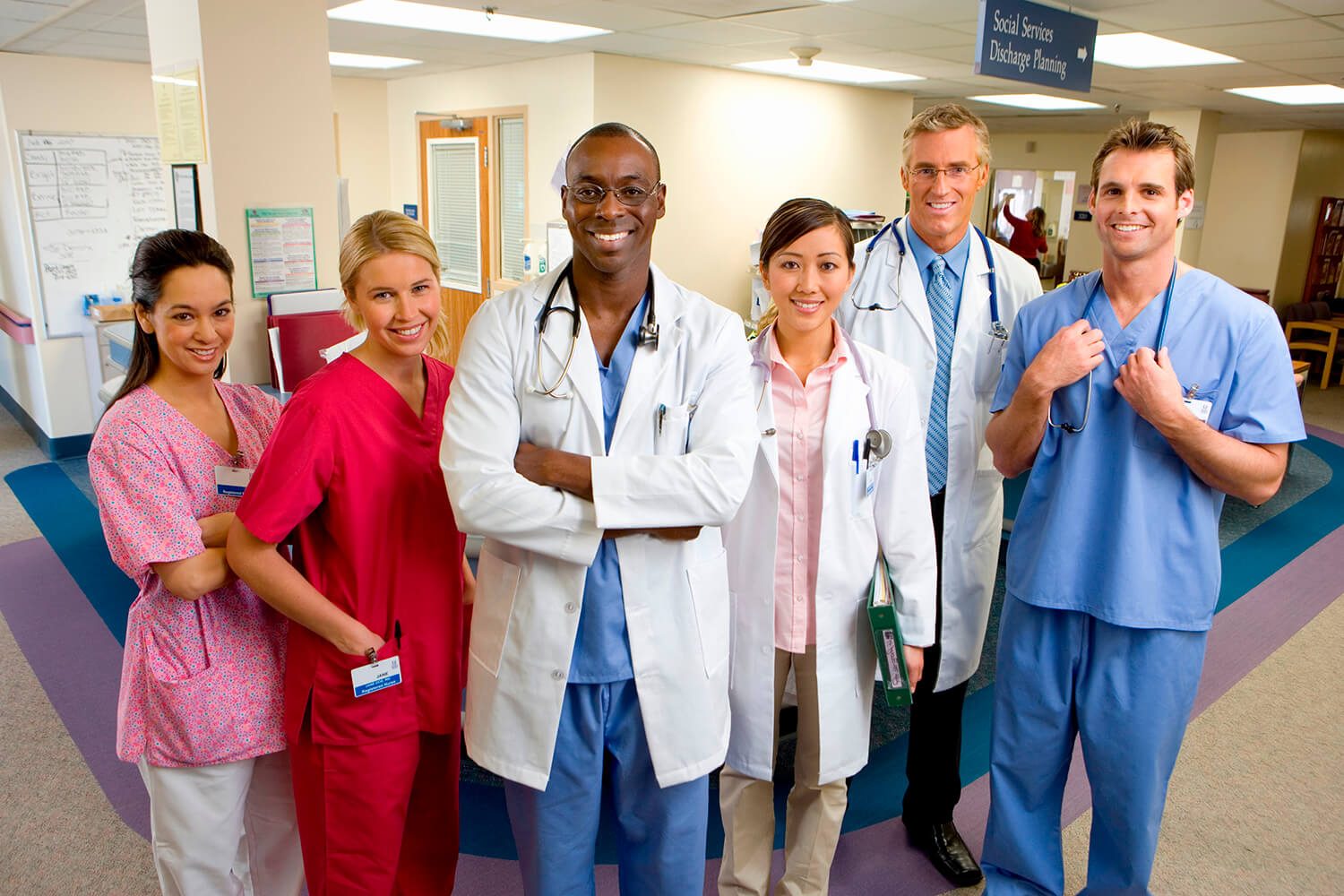 multi-ethnic-group-of-hospital-staff-standing-in-t-2025-10-15-05-04-47-utc